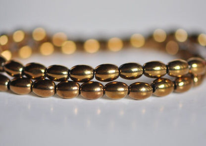50pcs Smooth Rice Glass Beads 4x6mm, Copper - (GM-008)