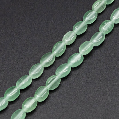 Cats Eye Beads Flat Oval 7x5mm, Full 14.5 inch strands (TR-077)