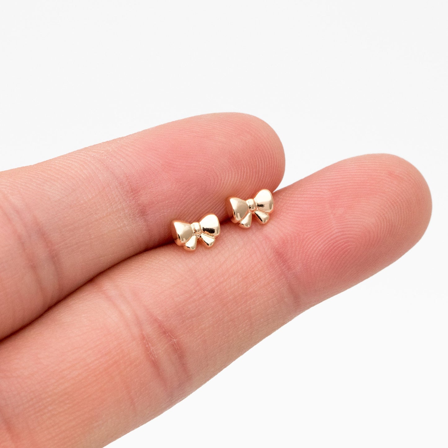 10pcs Tiny Bowknot Stud Earrings: 18K Gold Plated Brass (GB-4257)