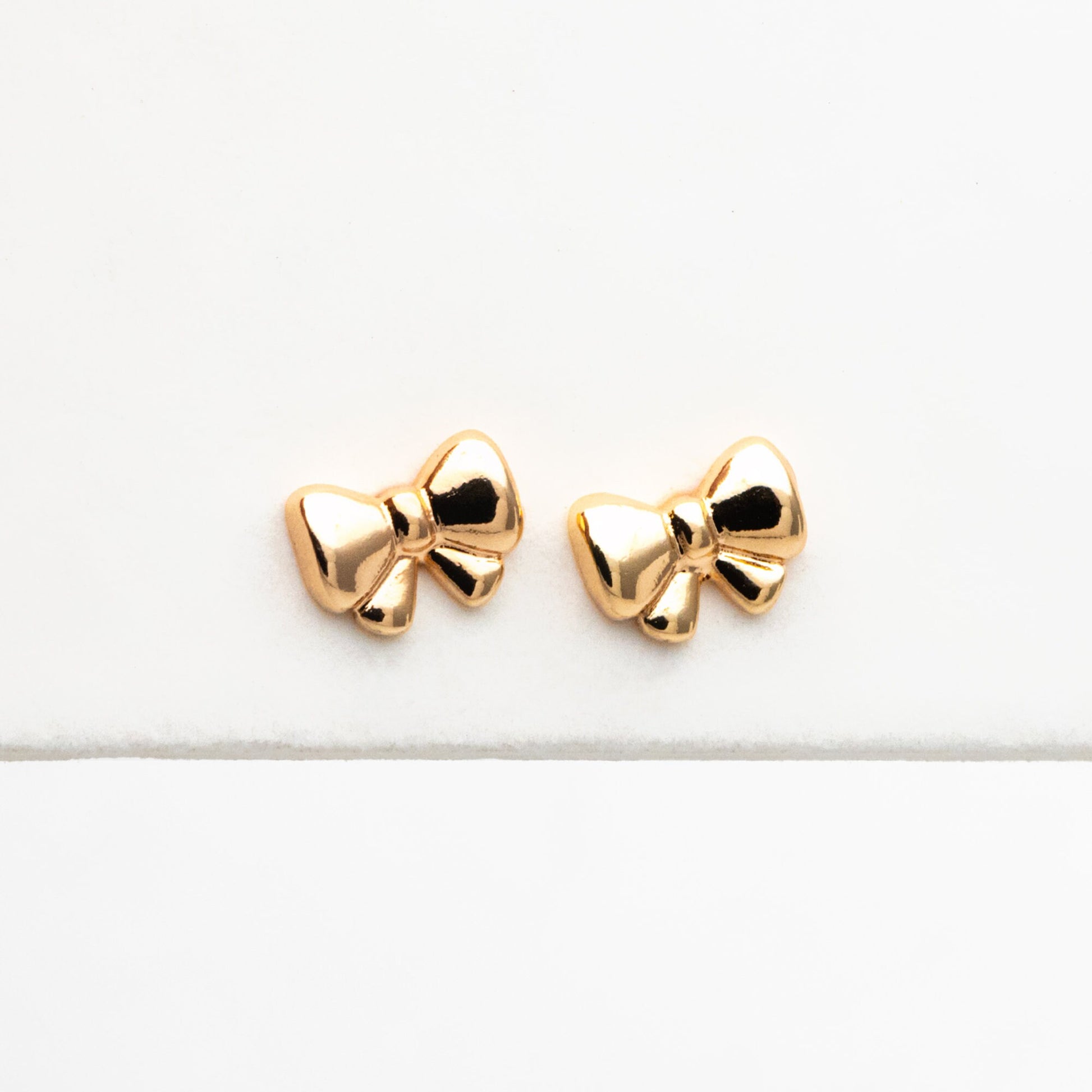 10pcs Tiny Bowknot Stud Earrings: 18K Gold Plated Brass (GB-4257)