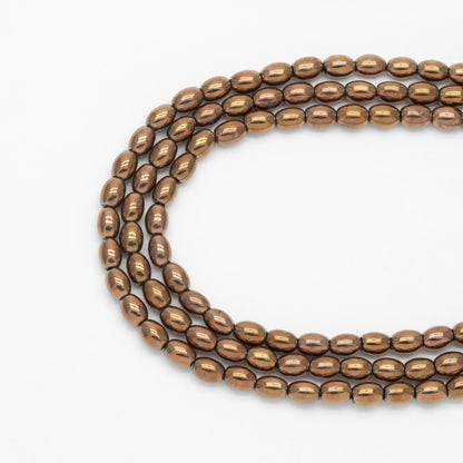 50pcs Smooth Rice Glass Beads 4x6mm, Copper - (GM-008)