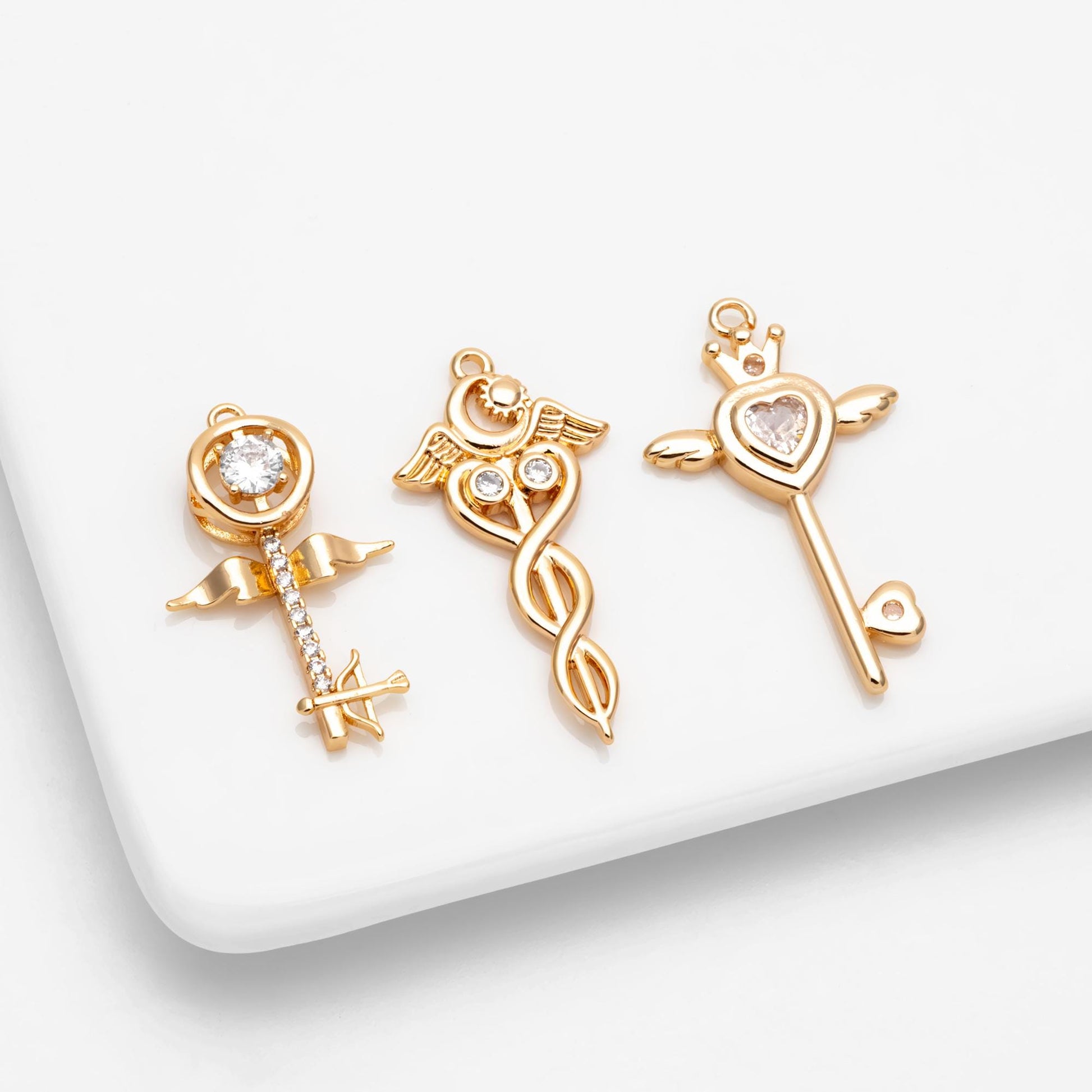 4pcs Gold Winged Key Charms: CZ Pave Fairy Wand Pendants (GB-2638)