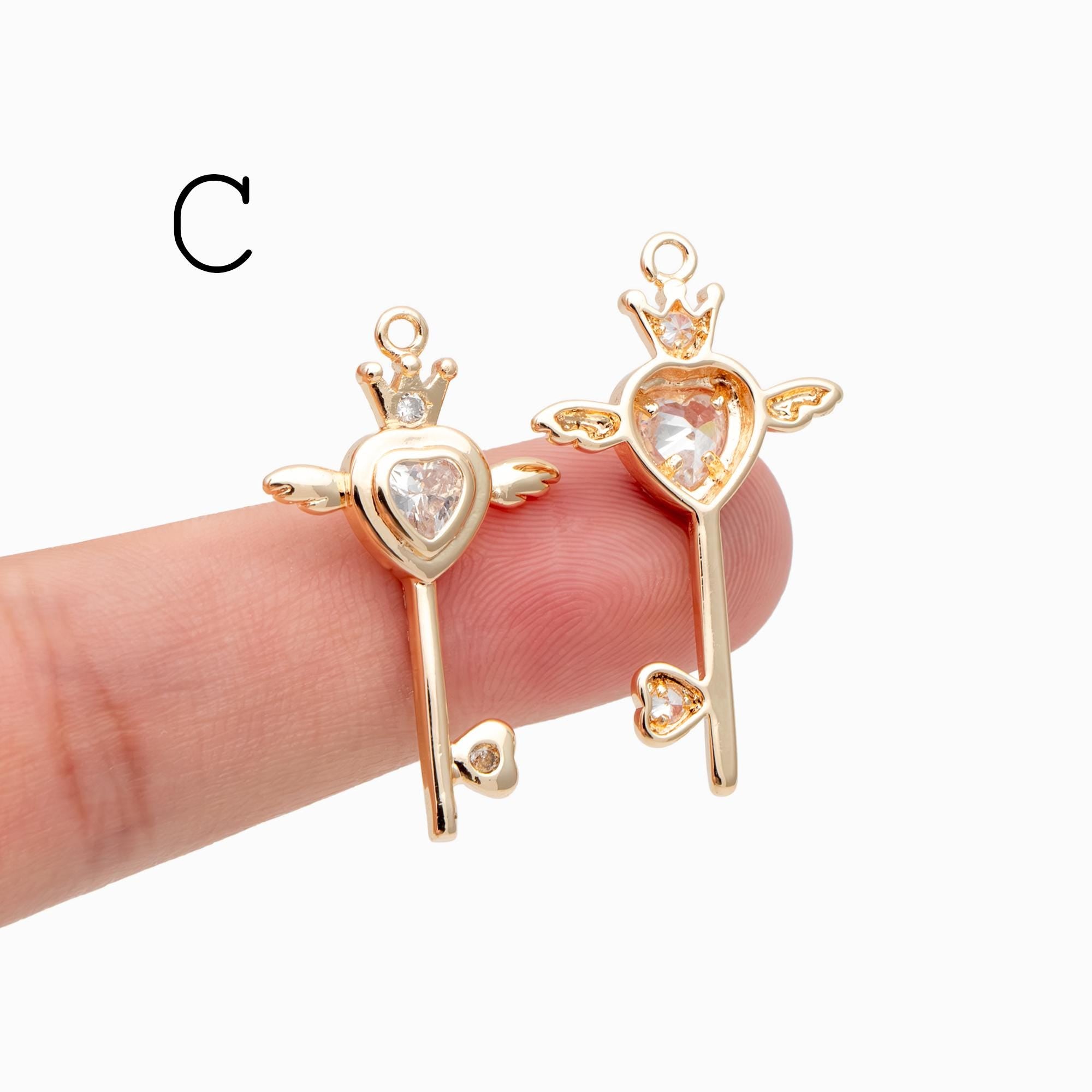 4pcs Gold Winged Key Charms: CZ Pave Fairy Wand Pendants (GB-2638)