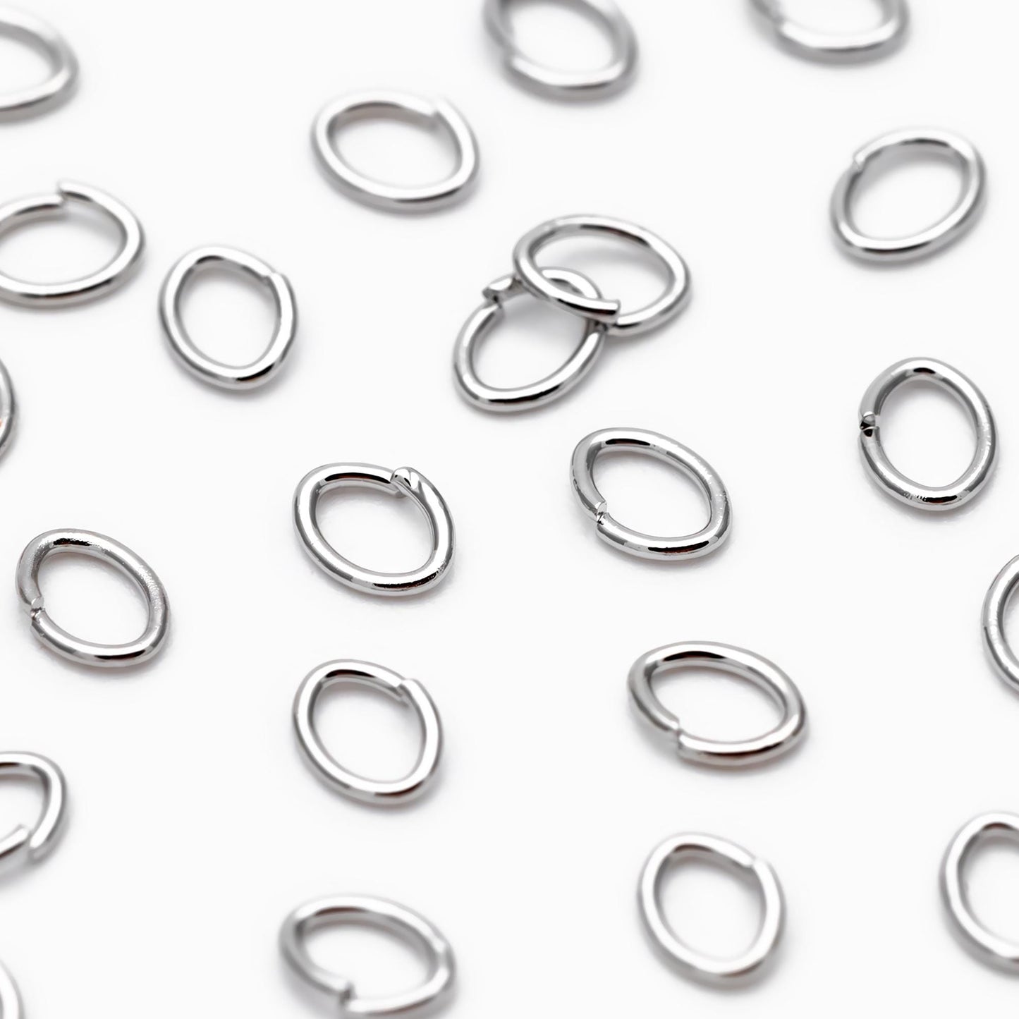 200pcs Gold/ Rhodium plated Stainless Steel Oval Jump Rings, Open Jump Rings, 4x3x0.5mm (24 Gauge) (GB-4776)