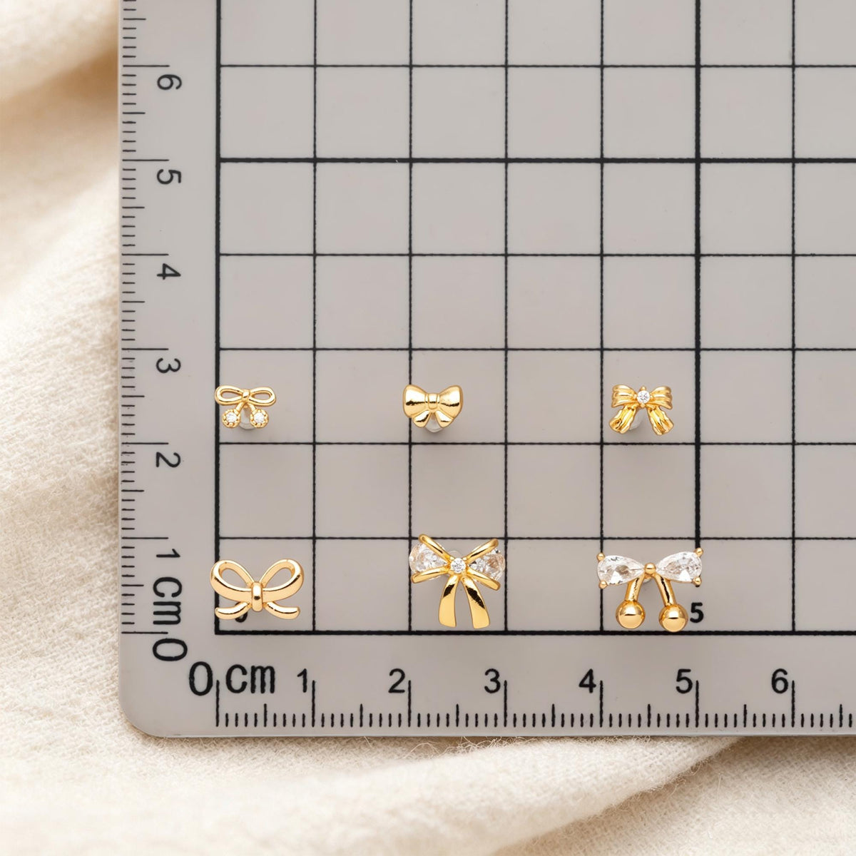 4pcs Tiny Bowknot Stud Earrings: 18K Gold Plated Brass (GB-4257)
